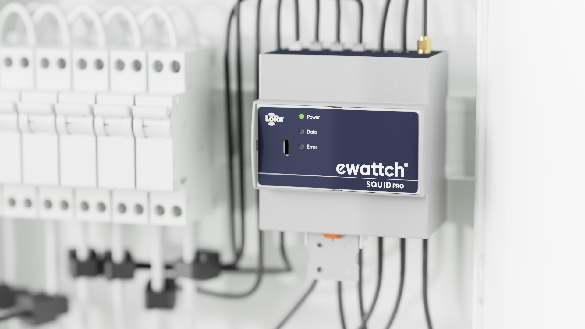 Module Squid Pro d’Ewattch installé dans un tableau électrique, mesurant les flux et consommations via LoRa.