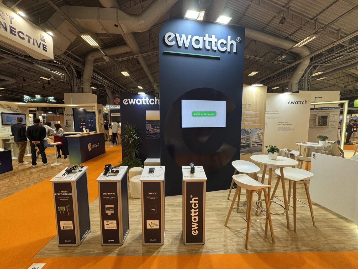 The Ewattch booth at the IBS 2025 trade show, showcasing energy monitoring, sub-metering, and smart building management solutions to professionals in the smart building industry.